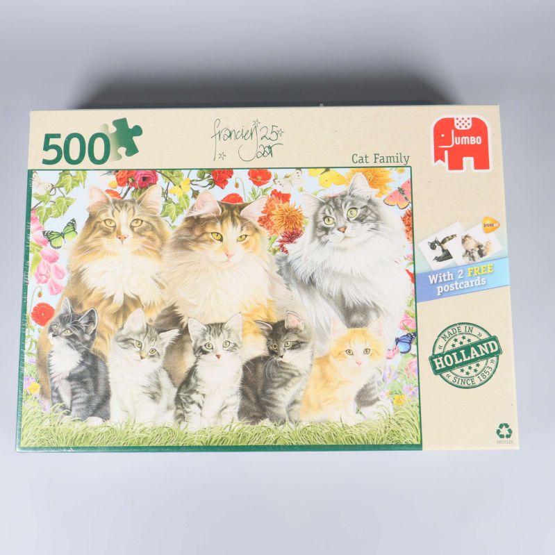 Framsidan av pussellådan med tecknade katter och 500 bitarsmärkning