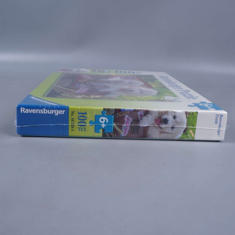 Ravensburger pusselask med tydligt varumärke på kanten