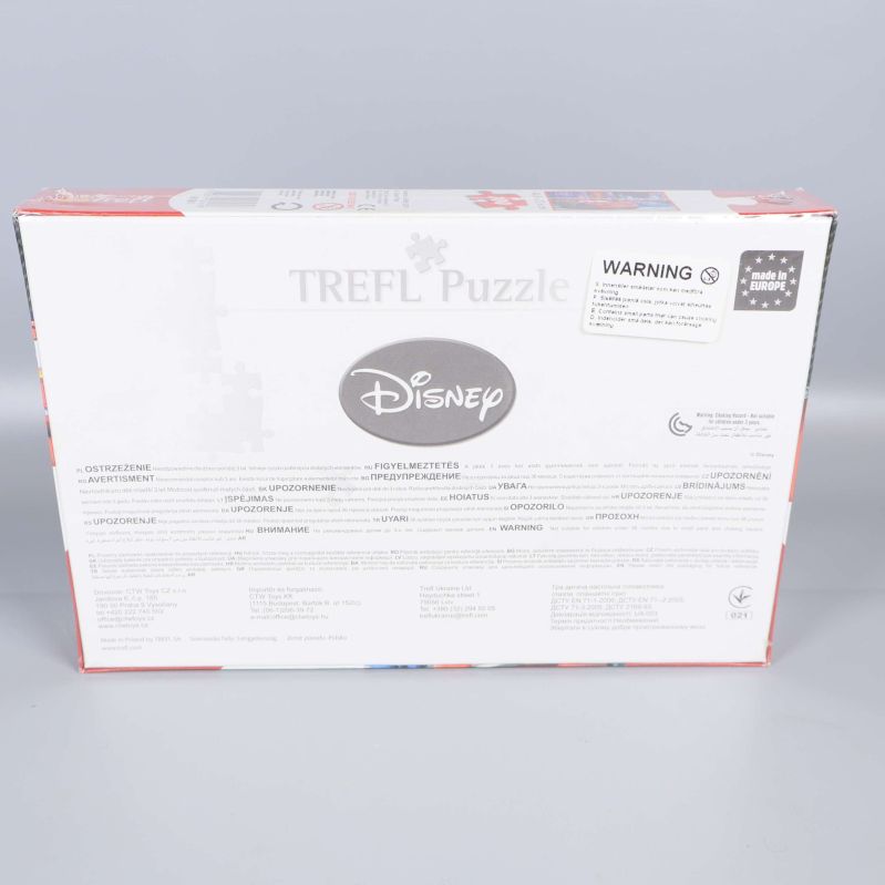 Baksida av Cars Trefl pussel med Disney-logga