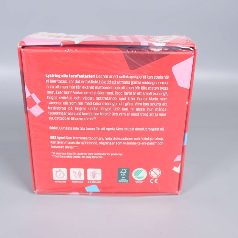 Baksidan på Taco Tajm-spel beskriver spelet kort