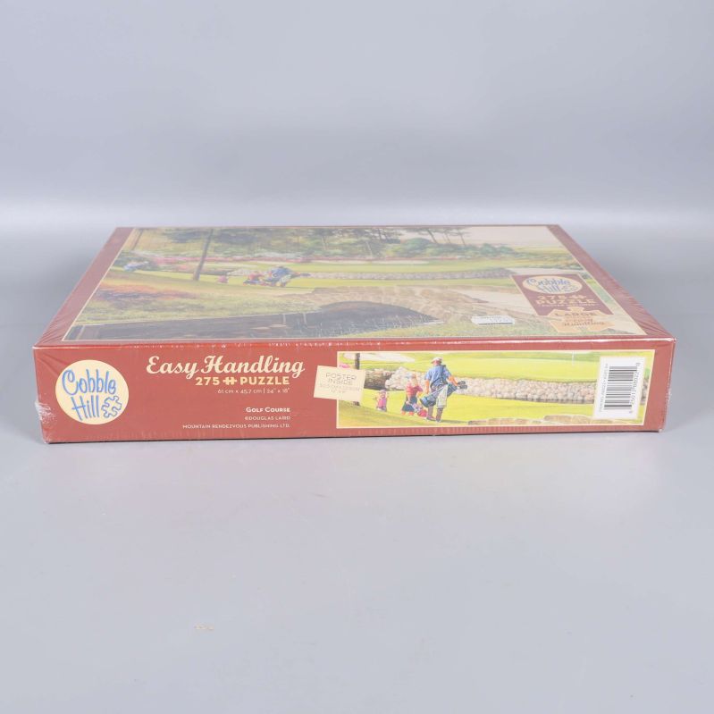 Sida av pusselkartongen med Easy Handling-text