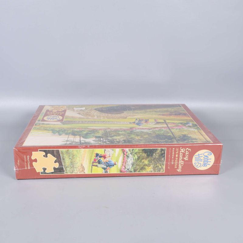 Motstående smalsida av pusselkartongen från Cobble Hill