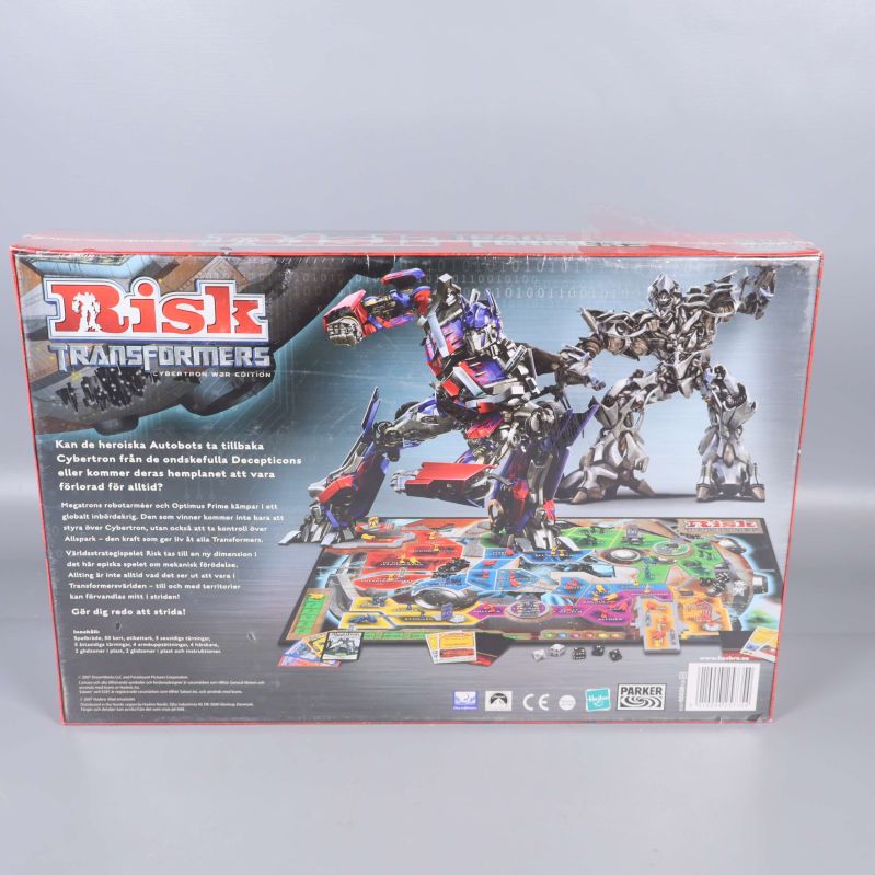 Baksida av spelkartongen Risk Transformers med spelplan och instruktioner