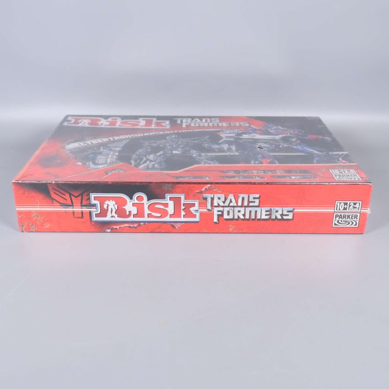 Risk Transformers lådans ovansida med logotyp och detaljer
