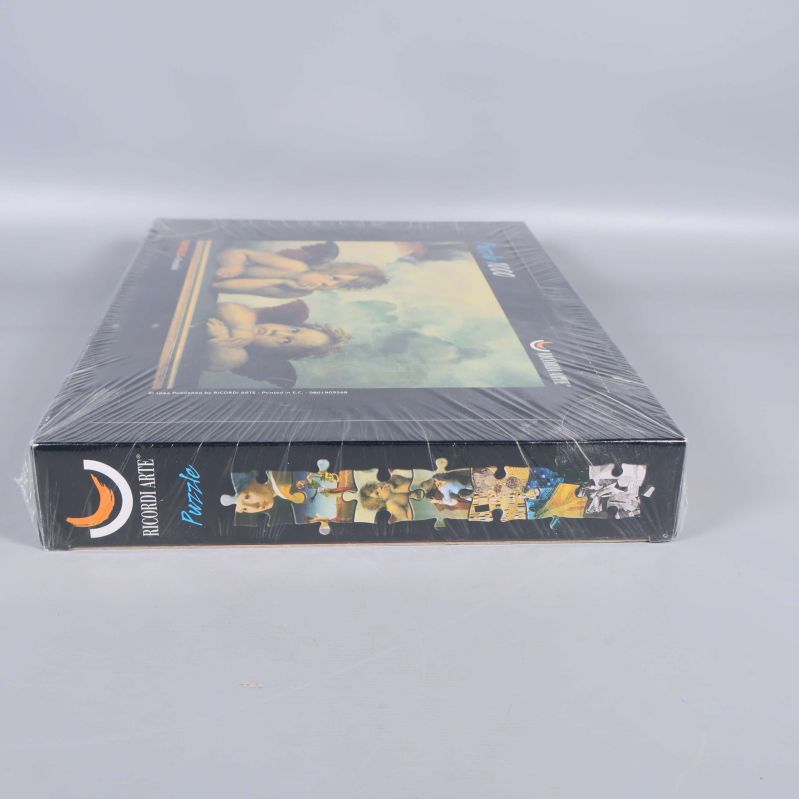 Ricordi Arte pussellåda sedd från sidan i plastförpackning