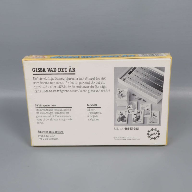 Baksidan av förpackningen till Gissa vad det är med innehållslista och instruktioner