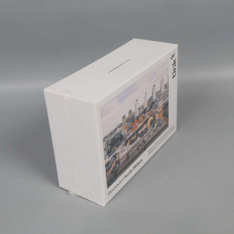 Pusselask sedd från andra sidan med stadsmotiv