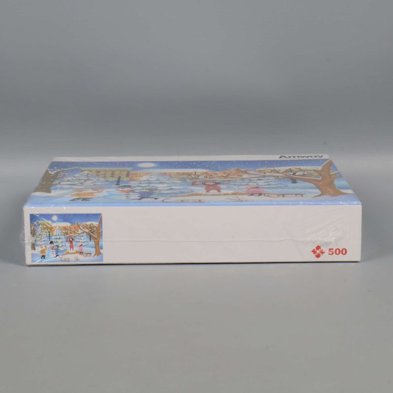 Nedre delen av pussellåda med 500-bitarssymbol