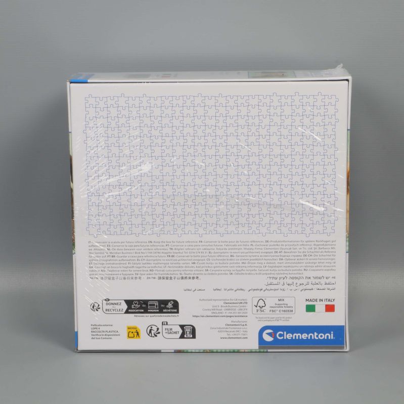 Baksidan av Clementoni pussellåda med bitmönster