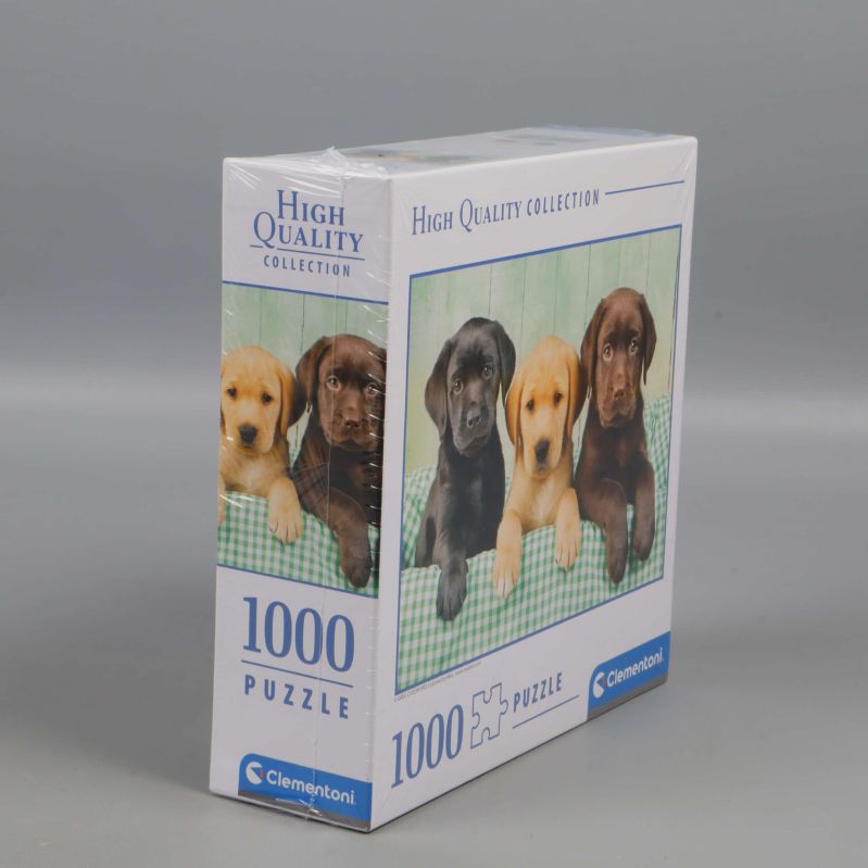 Sidan av pussellåda med motiv och antal bitar