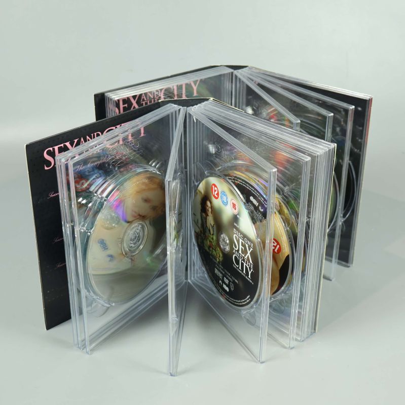 Sex and the City boxset öppnat med askar och skivor