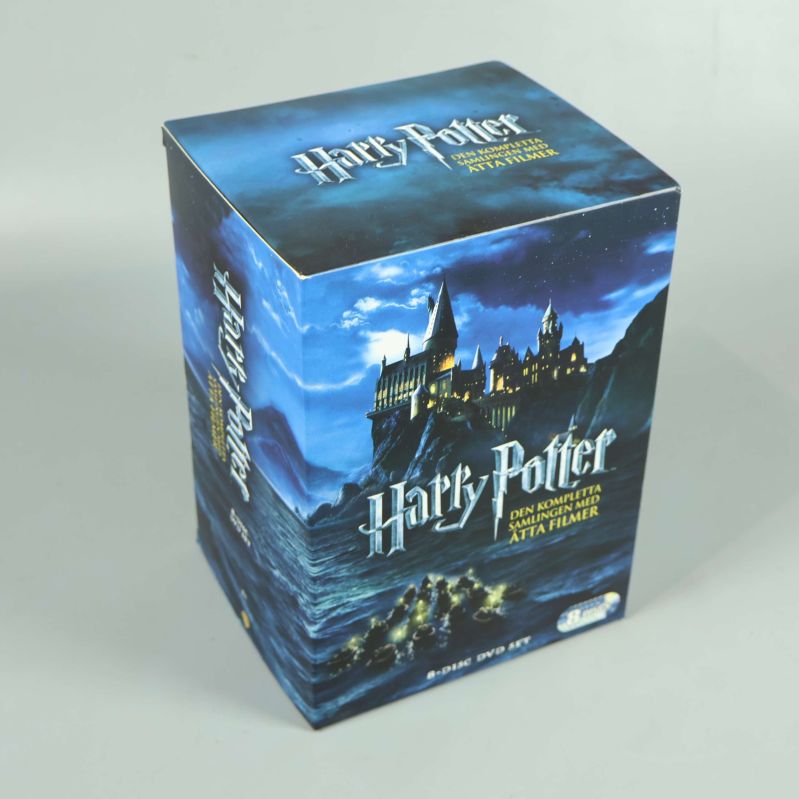 Harry Potter-filmbox i blå förpackning med Hogwarts