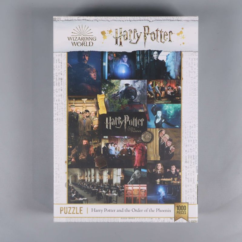 Framsidan av Harry Potter-pussel med collage av filmklipp och titel