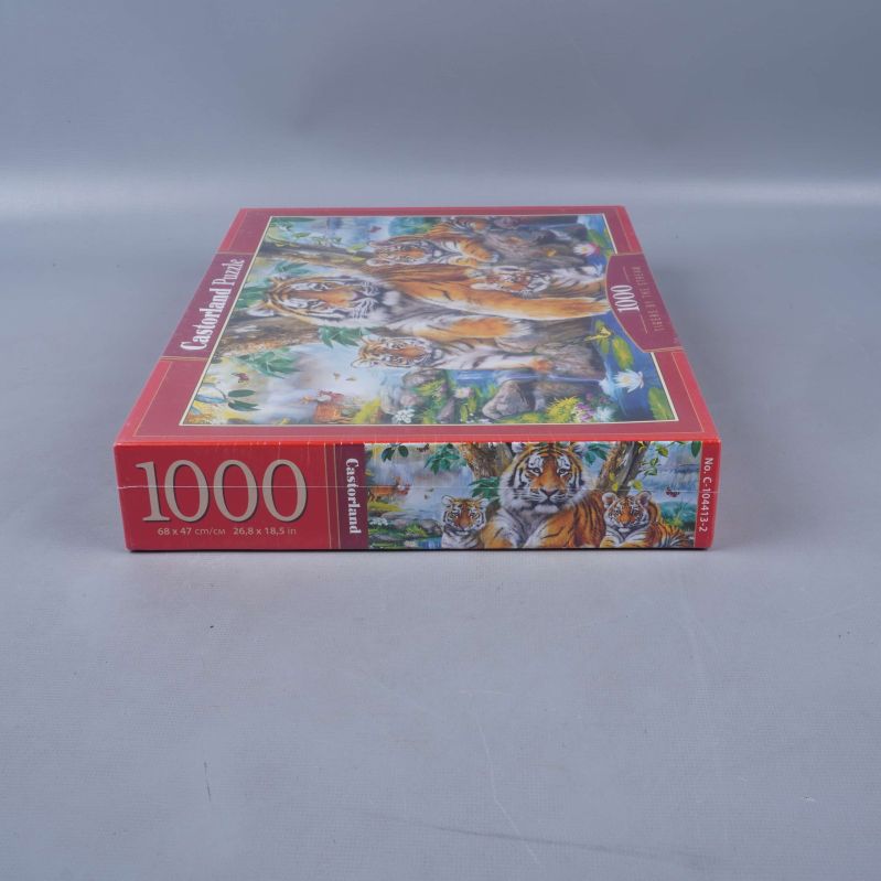 Långsida av pussellåda med 1000 bitar och tigerbild