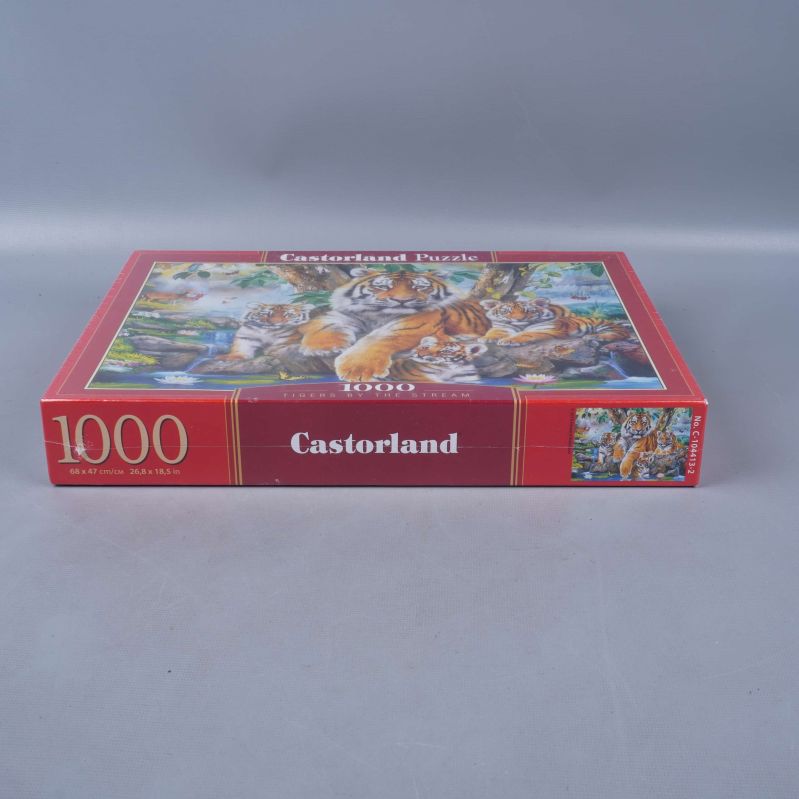 Sida av pussellåda med Castorland-logotyp samt tigerillustration