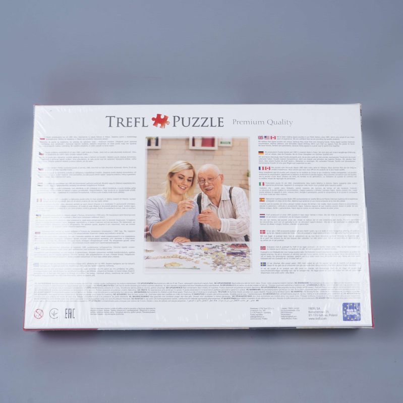 Baksida av Trefl pussellåda med informationstext