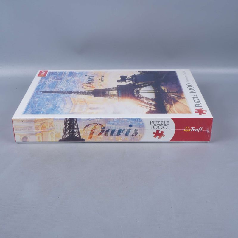 Sidoetikett på Paris pussellåda med motivdetaljer