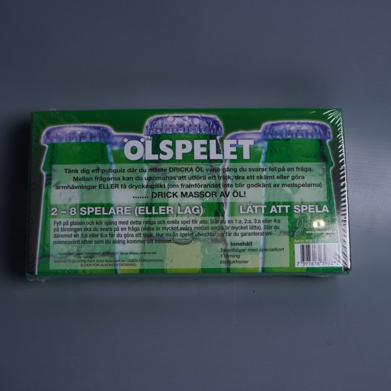 Baksida av Ölspelet med spelregler och beskrivning