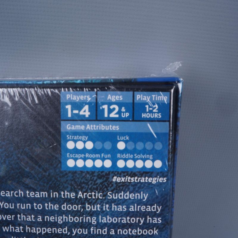 Närbild av spelbox med antal spelare och ålder synligt