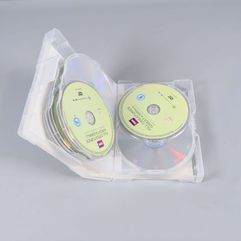 Öppen DVD-box som visar åtta ordnade skivor