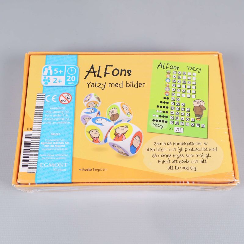 Baksidan på Alfons Yatzy visar tärningar och regler