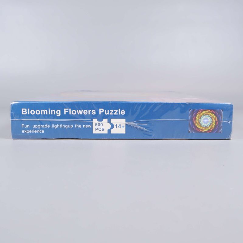 Sida av pusselask med texten Blooming Flowers Puzzle och 500 bitar