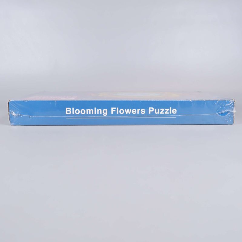 Sida på pusselask med texten Blooming Flowers Puzzle