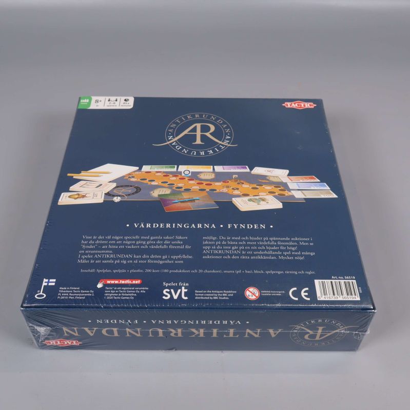 Baksidan av Antikrundan spelet med komponenter synliga