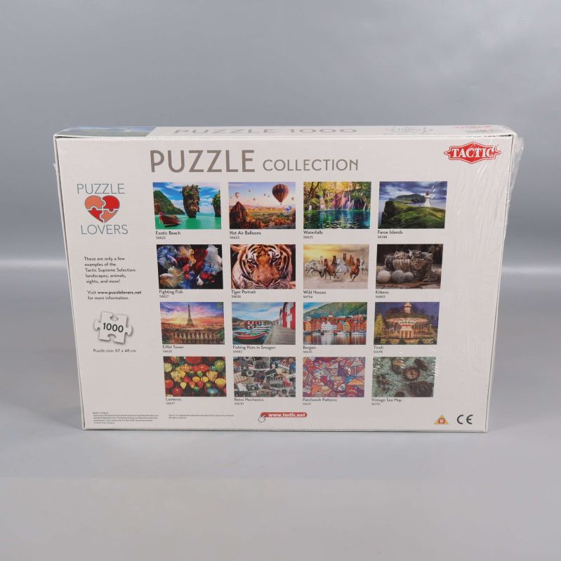Baksidan av asken med fler motivbilder från Tactic Puzzle Collection