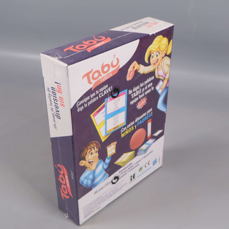 Sned vy av Tabu Familj spelbox där både fram- och baksida är synliga
