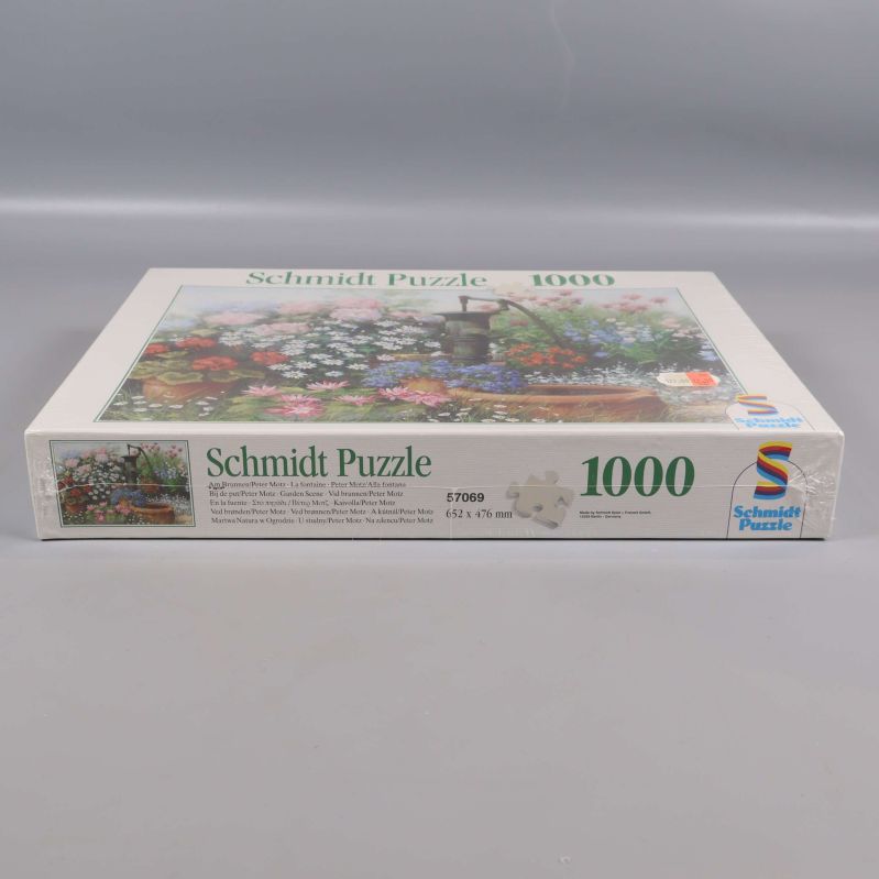 Sidovy av Schmidt Puzzle med antal bitar och mått angivna