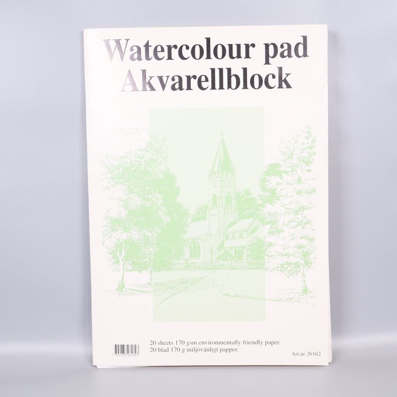 Framsidan av akvarellblock med motiv av kyrka