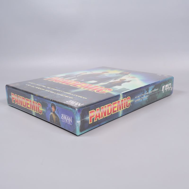 Pandemic brädspel liggande, visar sidotryck
