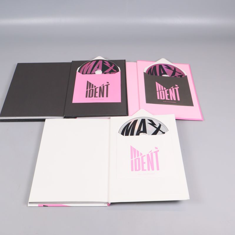 MAXIDENT-album öppna med runda inslag och grafisk design