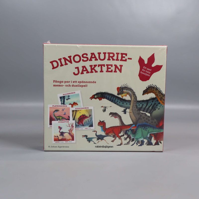 Framifrån på spelboxen Dinosauriejakten med dinosauriemotiv