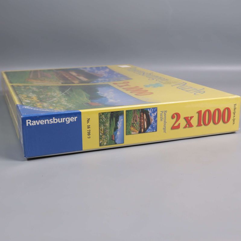 Andra sidan av pusselboxen visar Ravensburger-logotyp och motiv