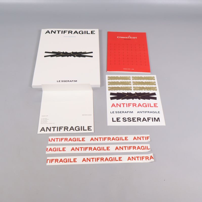 Albuminnehåll: fotobok, stickers, affisch och CD