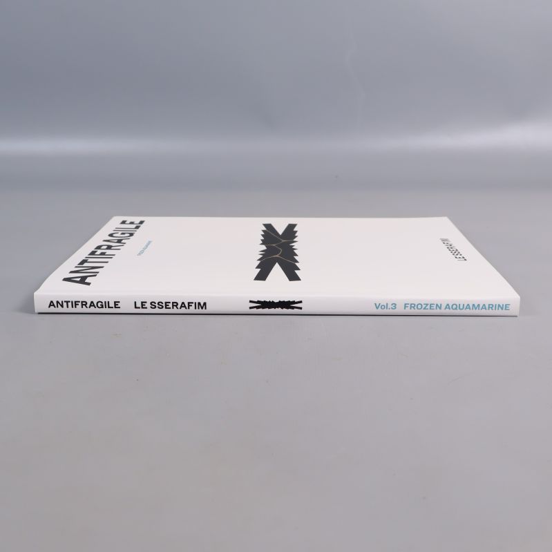 Albumets rygg med text och guldtryck