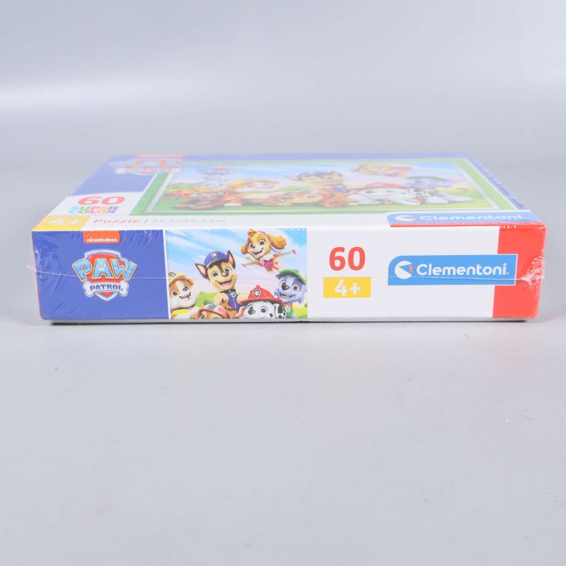 Sidovy av Paw Patrol pusselask med antal bitar och åldersmärkning