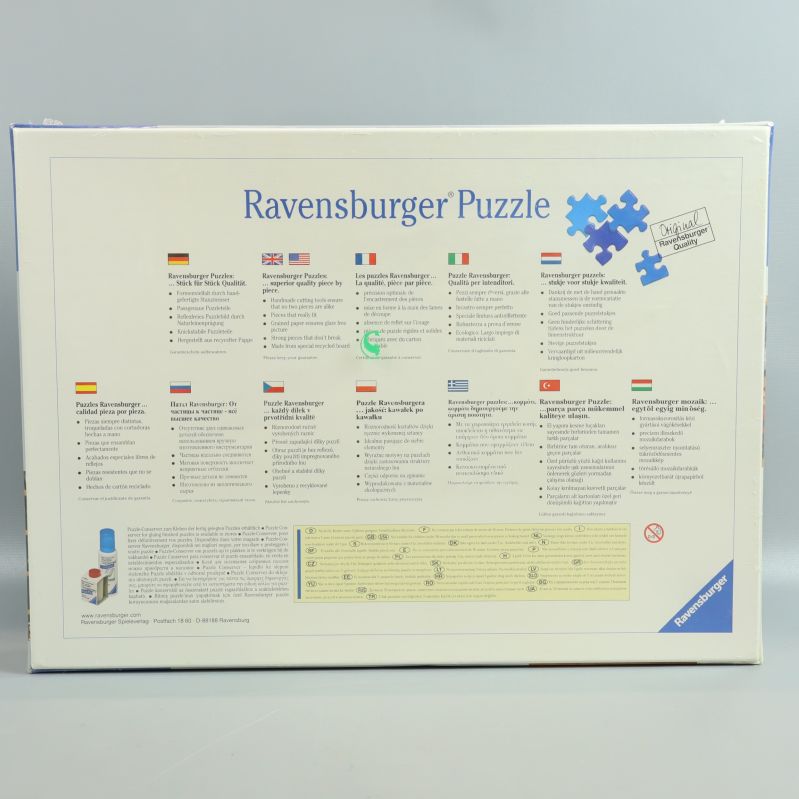 Baksida av Ravensburger pussel med text på flera språk