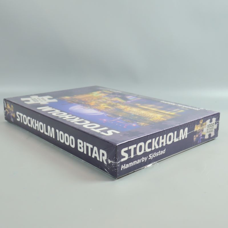 Sidovy av pusselasken med texten 1000 bitar