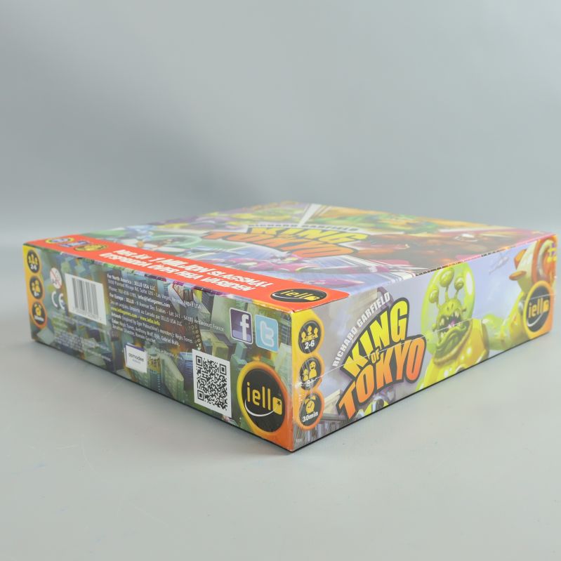 Höger sida av King of Tokyo-asken med spelsymboler
