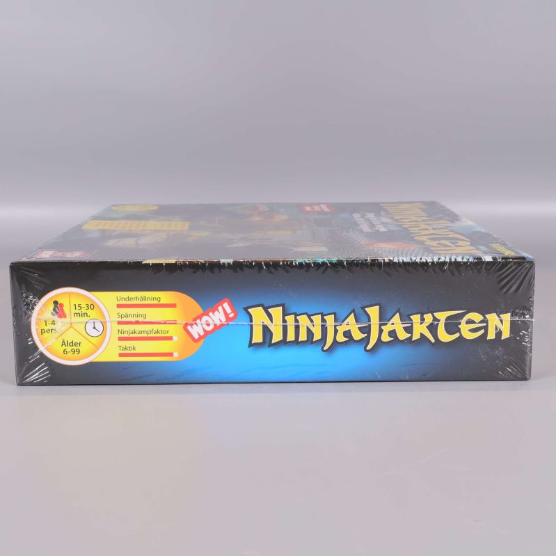 Sidoetikett med NinjaJakten logotyp och symboler