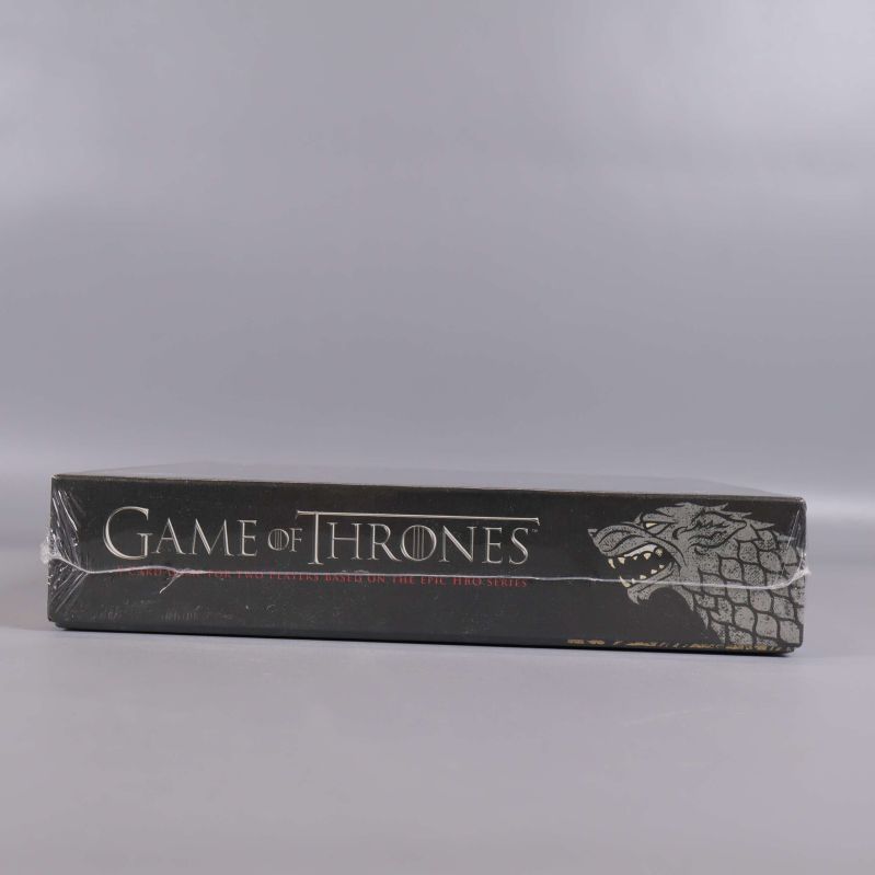 Långsida av Game of Thrones brädspel med logotyp