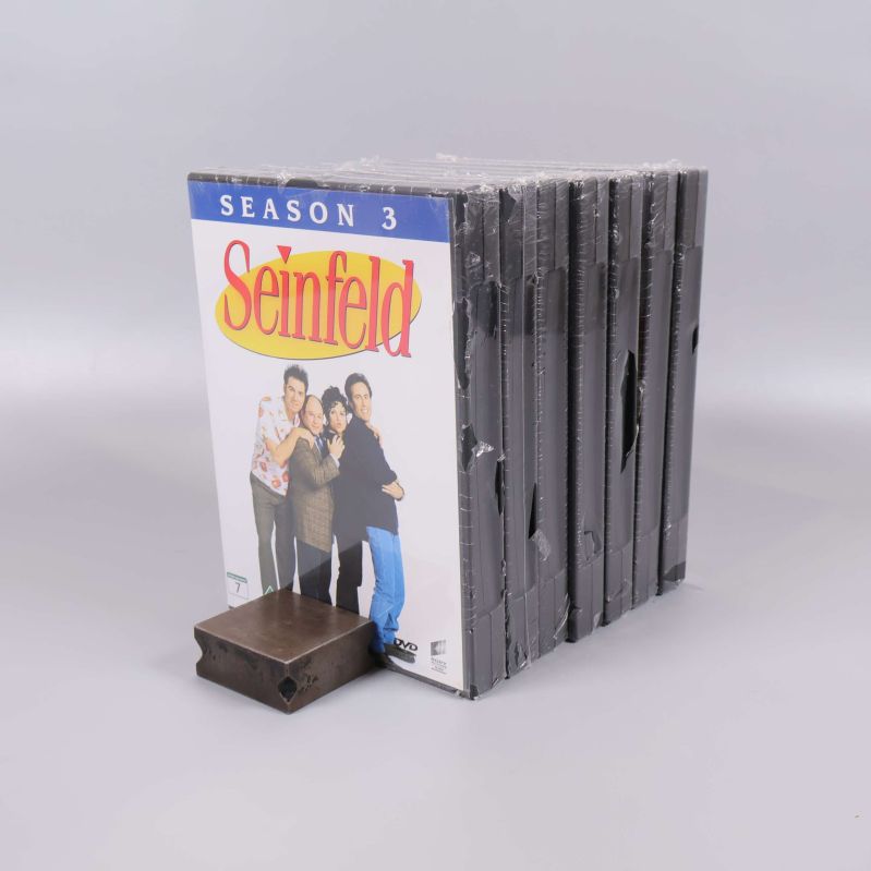 Sida av rad med Seinfeld DVD-fodral uppradade säsong 3 till 9