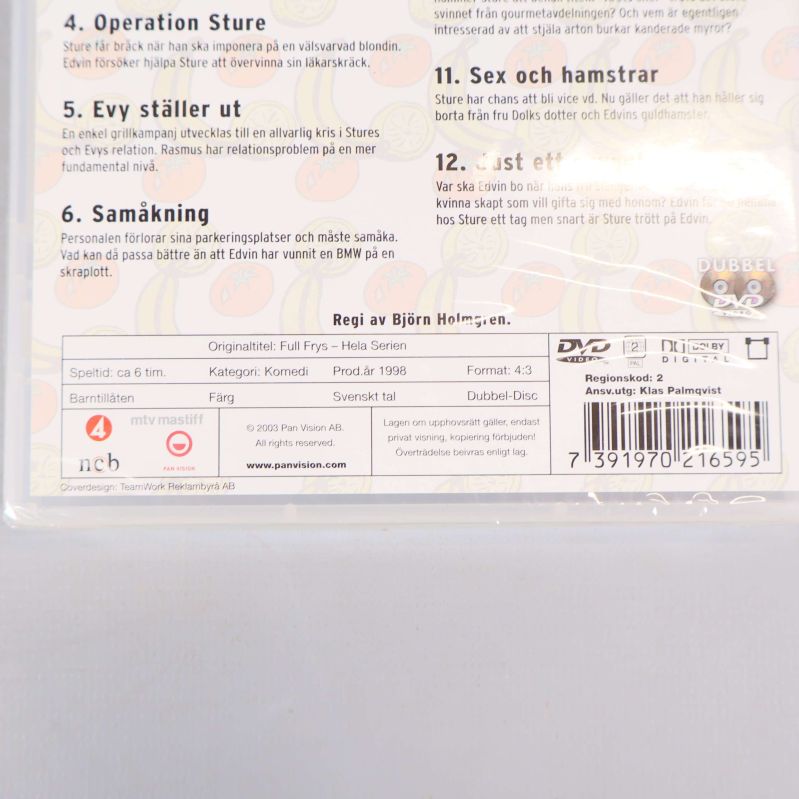 Närbild på baksidan med utgivarinformation och detaljer