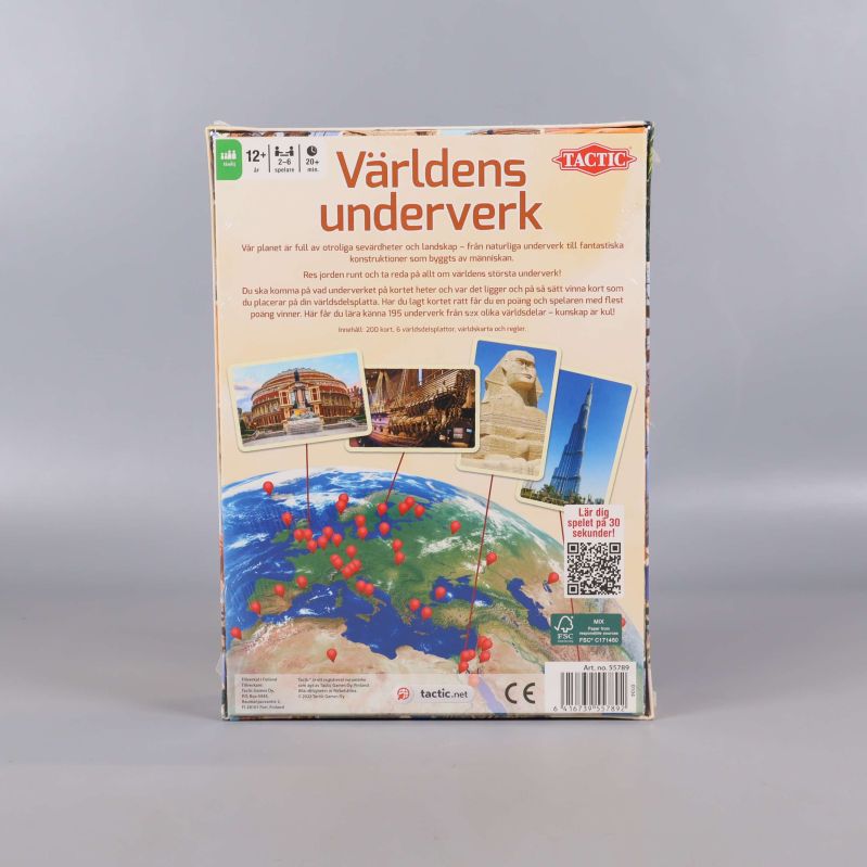 Baksidan av spelasken Världens underverk med spelinformation