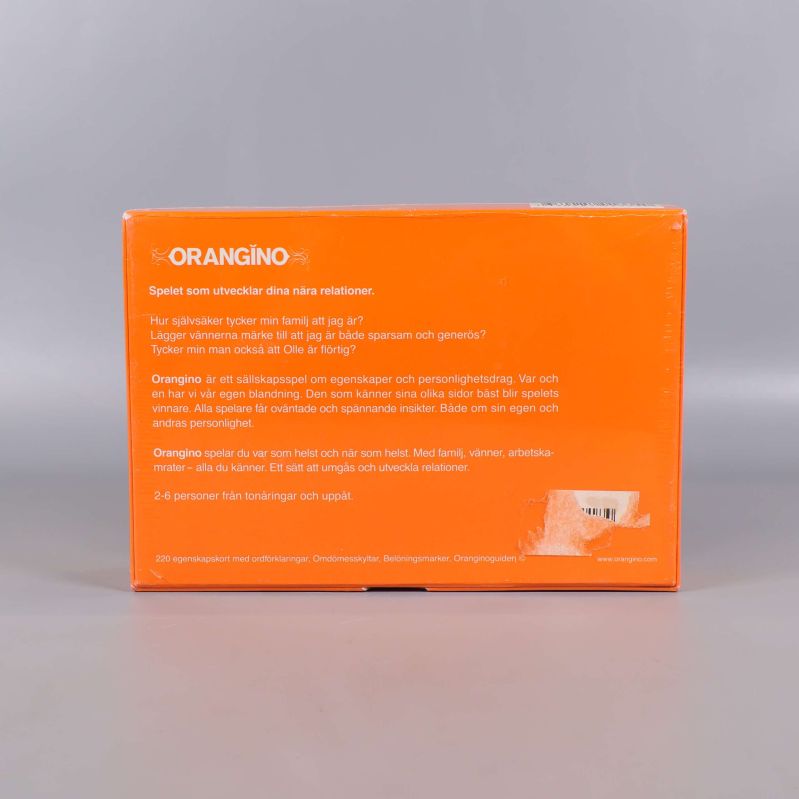 Baksidan av Orangino spelbox med kort beskrivning av spelet