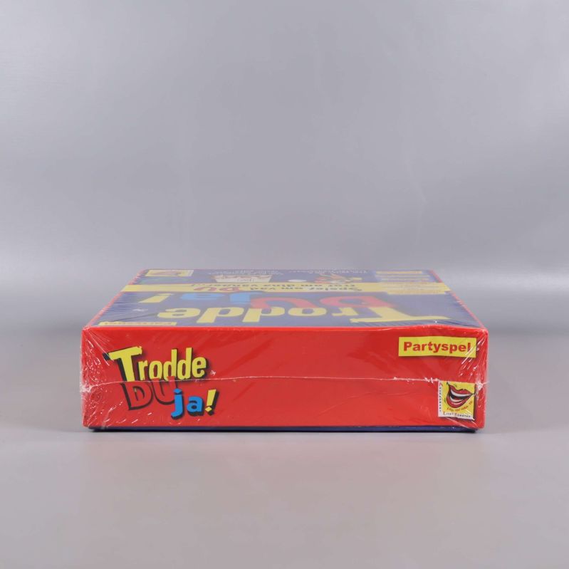 Undersidan av spelboxen Trodde du ja med logotyp och namn