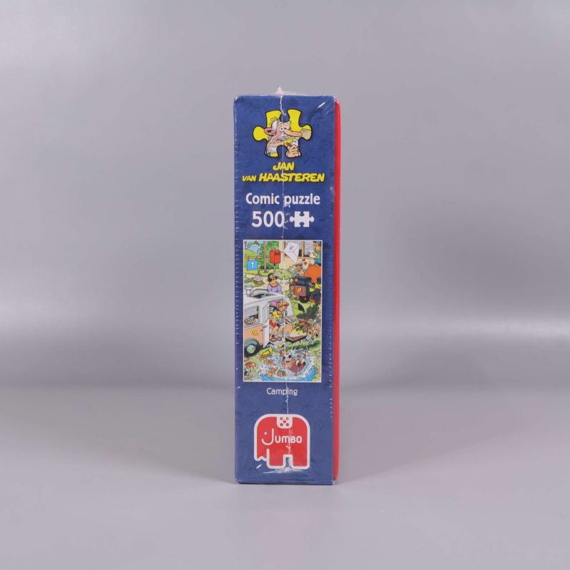 Sida av comic puzzle 500 bitar med motiv och logotyper